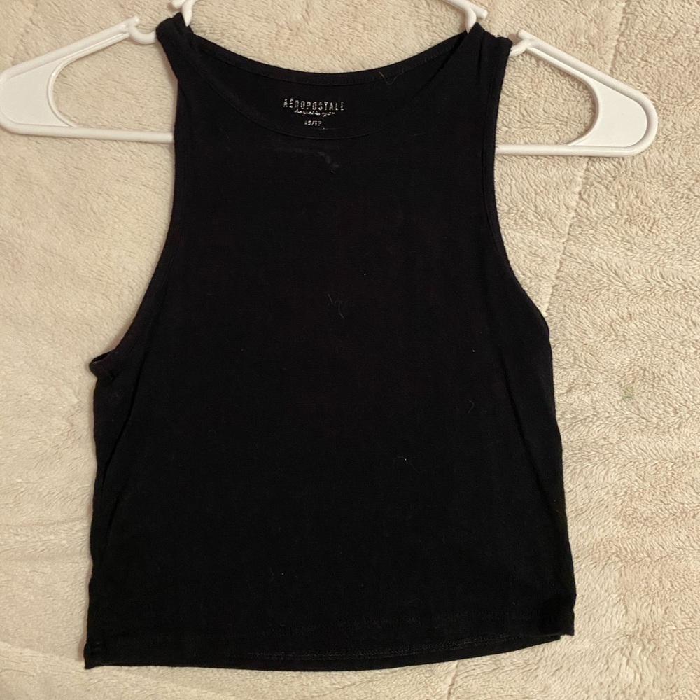 Black cropped tank top.